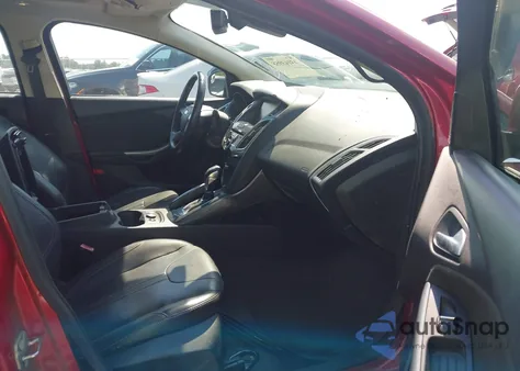 2012 Ford Focus Titanium z USA, uszkodzony, nr VIN 1FAHP3J21CL258049